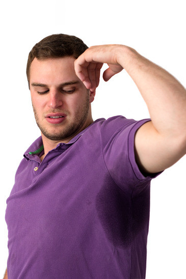 Man sweating very badly under armpit