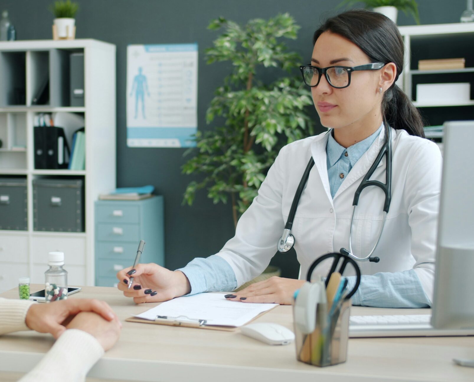 A doctor in a consultation with a patient